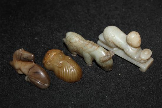 Four Chinese pale grey/brown jade carvings, inc a recumbent horse, a yak, a scarab & a kneeling figure